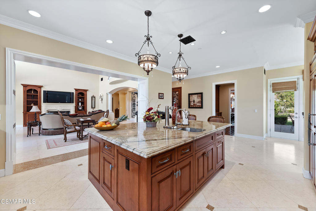 2462 Lost Canyons Drive Simi Valley, CA 93065 - Photo 15 of 50 a large kitchen island with a large island in it