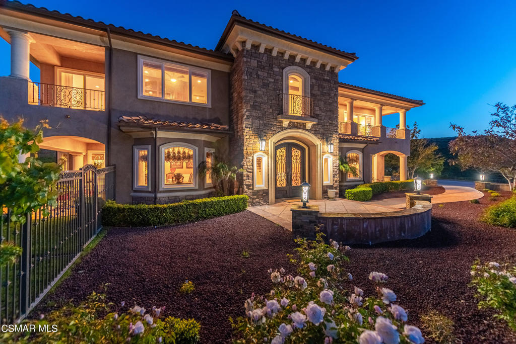 2462 Lost Canyons Drive Simi Valley, CA 93065 - Photo 2 of 50 a front view of a house with garden