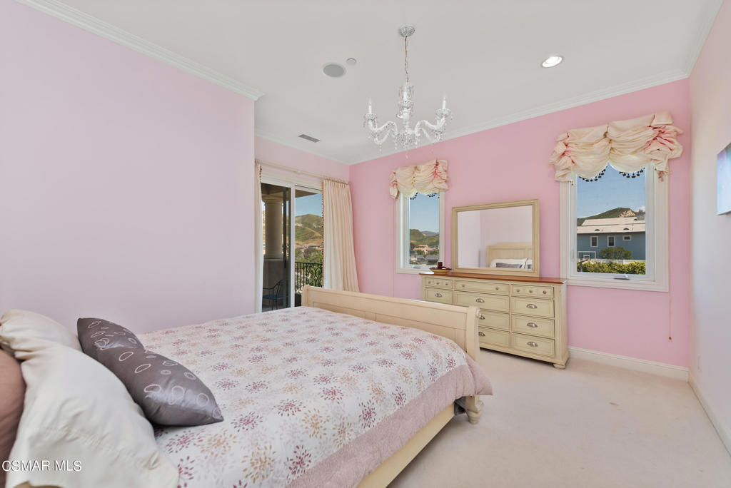 2462 Lost Canyons Drive Simi Valley, CA 93065 - Photo 25 of 50 a bedroom with a large bed and a dresser