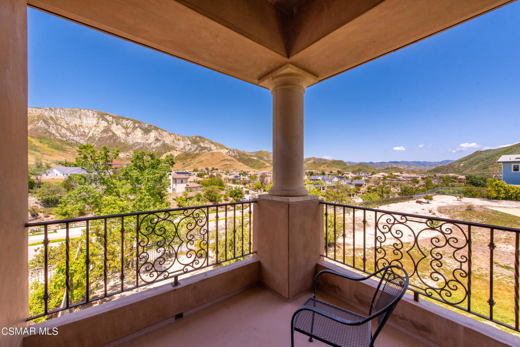 2462 Lost Canyons Drive Simi Valley, CA 93065 - Photo 27 of 50 a view of a city from a balcony with furniture