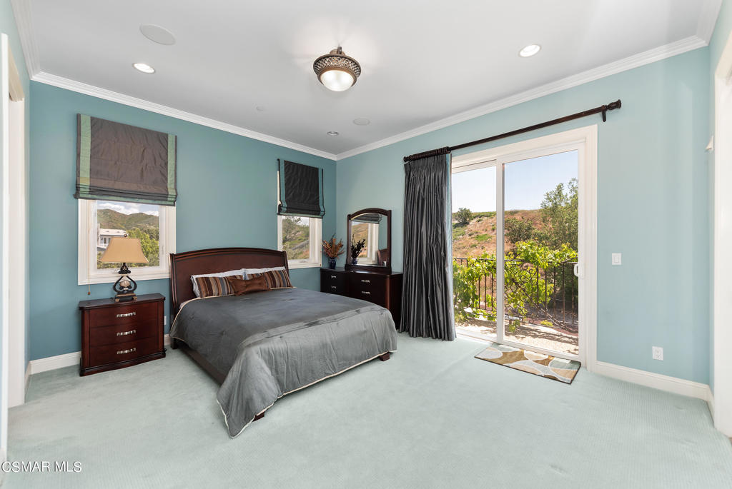 2462 Lost Canyons Drive Simi Valley, CA 93065 - Photo 28 of 50 a living room with a bed furniture and large window