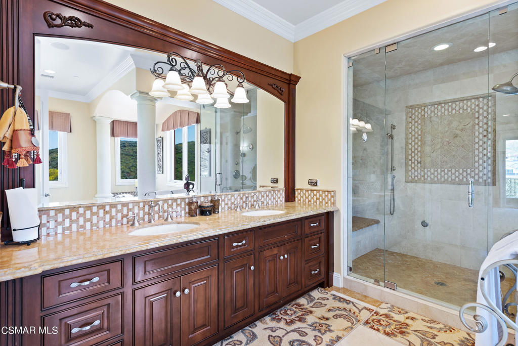 2462 Lost Canyons Drive Simi Valley, CA 93065 - Photo 37 of 50 a bathroom with a double vanity sink mirror and shower