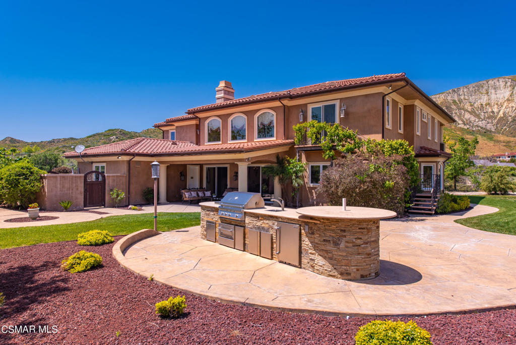2462 Lost Canyons Drive Simi Valley, CA 93065 - Photo 40 of 50 a view of a house with pool and chairs