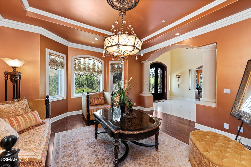 2462 Lost Canyons Drive Simi Valley, CA 93065 - Photo 6 of 50 a living room with furniture a chandelier and a chandelier