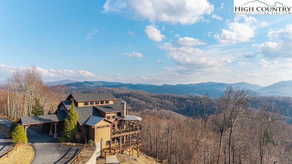 105 B Beaver Dam Road Elk Park, NC 28622 - Photo 16 of 31 a view of a terrace with a garden