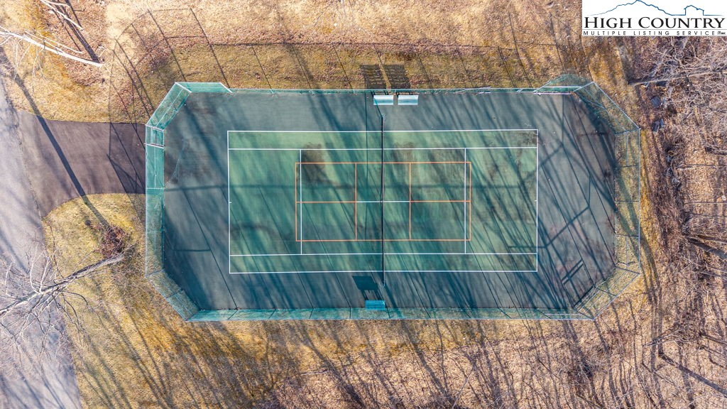 105 B Beaver Dam Road Elk Park, NC 28622 - Photo 21 of 31 a bathroom with a shower and a sink