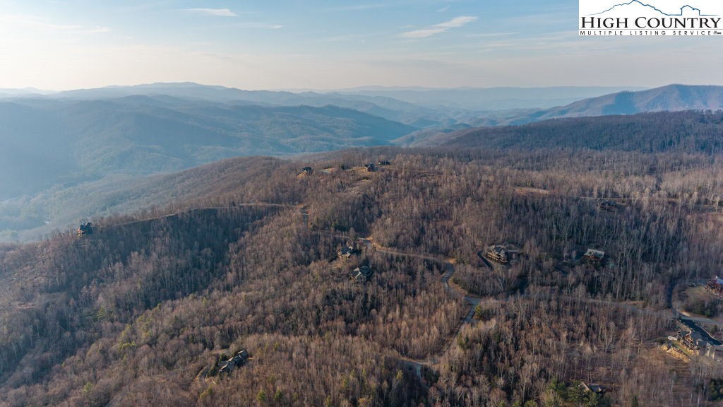 105 B Beaver Dam Road Elk Park, NC 28622 - Photo 29 of 31 a view of a dry yard with green space