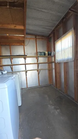 a view of a room with racks on the wall