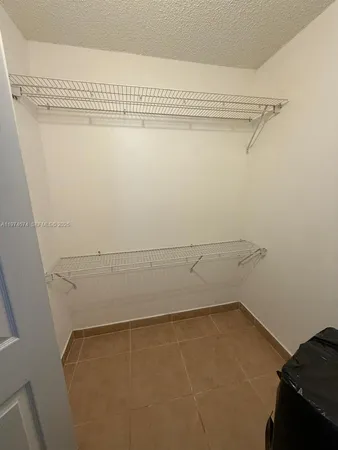a view of a room with racks on the wall