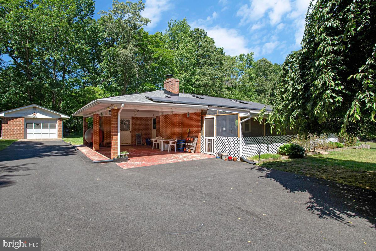 6600 Ashland Road La Plata, MD 20646 - Photo 33 of 40 a view of a house with a yard and sitting area