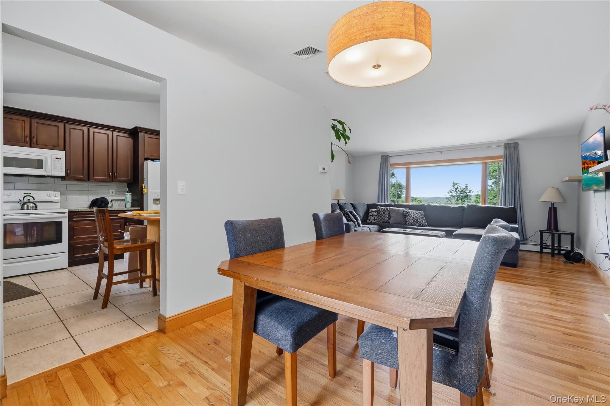 318 Beattie Road Washingtonville, NY 10992 - Photo 11 of 42 a view of a dining room with furniture