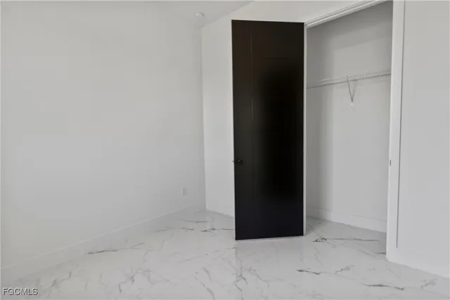 a view of a kitchen with flat screen tv