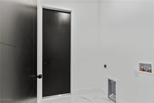 a bathroom with a toilet shower and double vanity