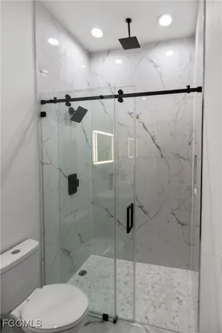 an empty room with a bathroom