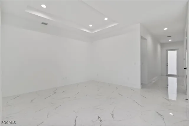 a kitchen with stainless steel appliances granite countertop a stove and a sink