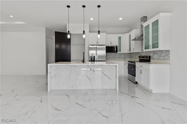 a bathroom with a sink and a shower