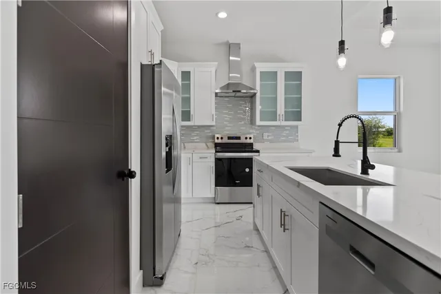 a view of an empty room and a window