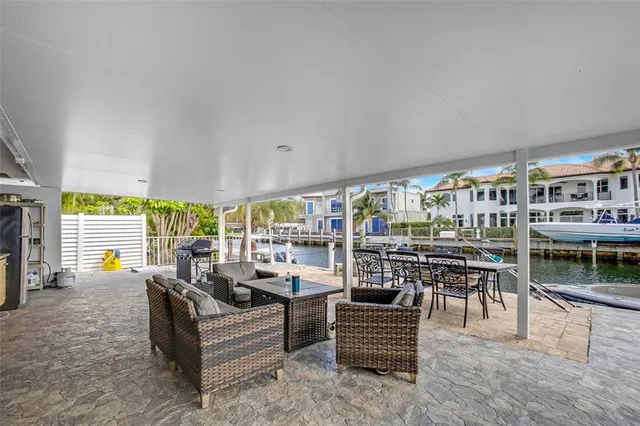 a view of a house with backyard and porch