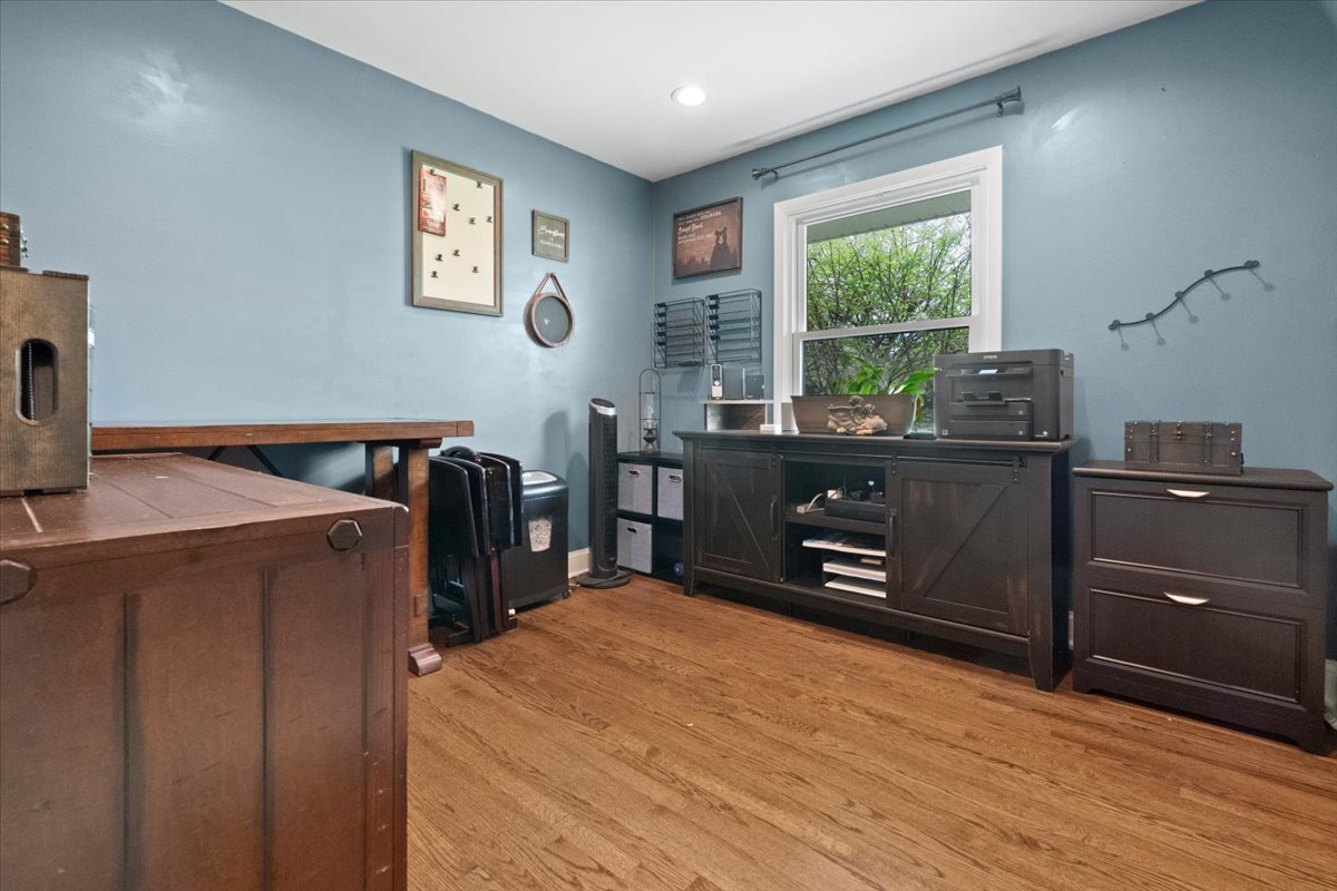 2517 Salem Boulevard Zion, IL 60099 - Photo 11 of 32 a bed room with a bed and a tv