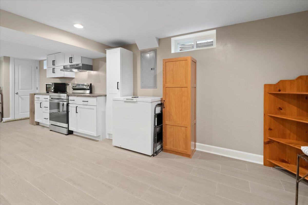 2517 Salem Boulevard Zion, IL 60099 - Photo 24 of 32 a view of kitchen with furniture and refrigerator