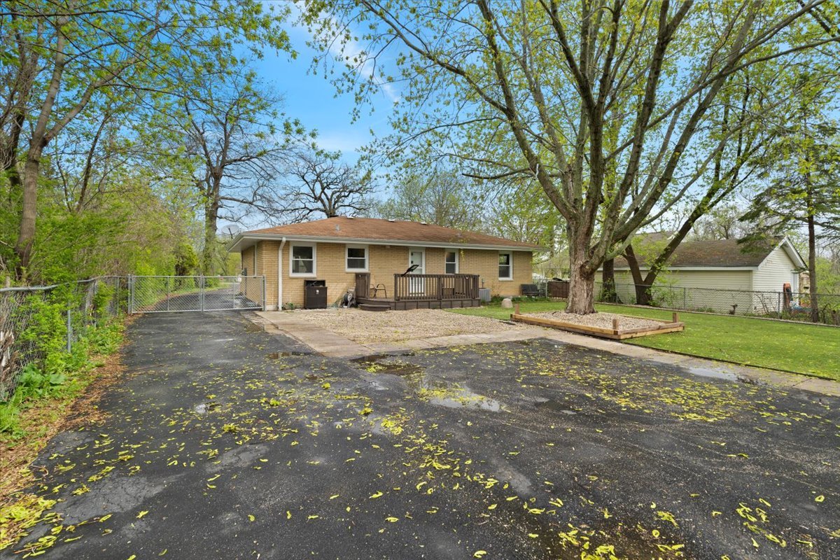 2517 Salem Boulevard Zion, IL 60099 - Photo 32 of 32 a front view of a house with a yard