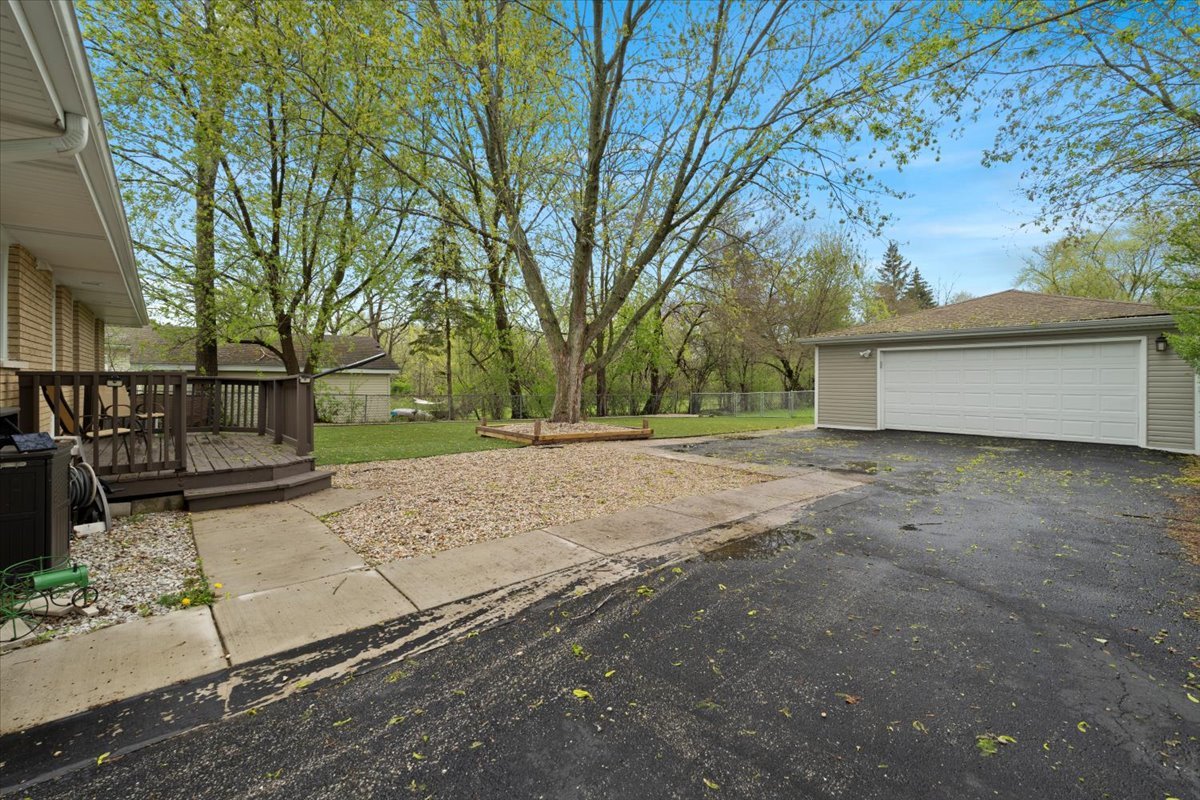 2517 Salem Boulevard Zion, IL 60099 - Photo 4 of 32 a view of a backyard with large trees
