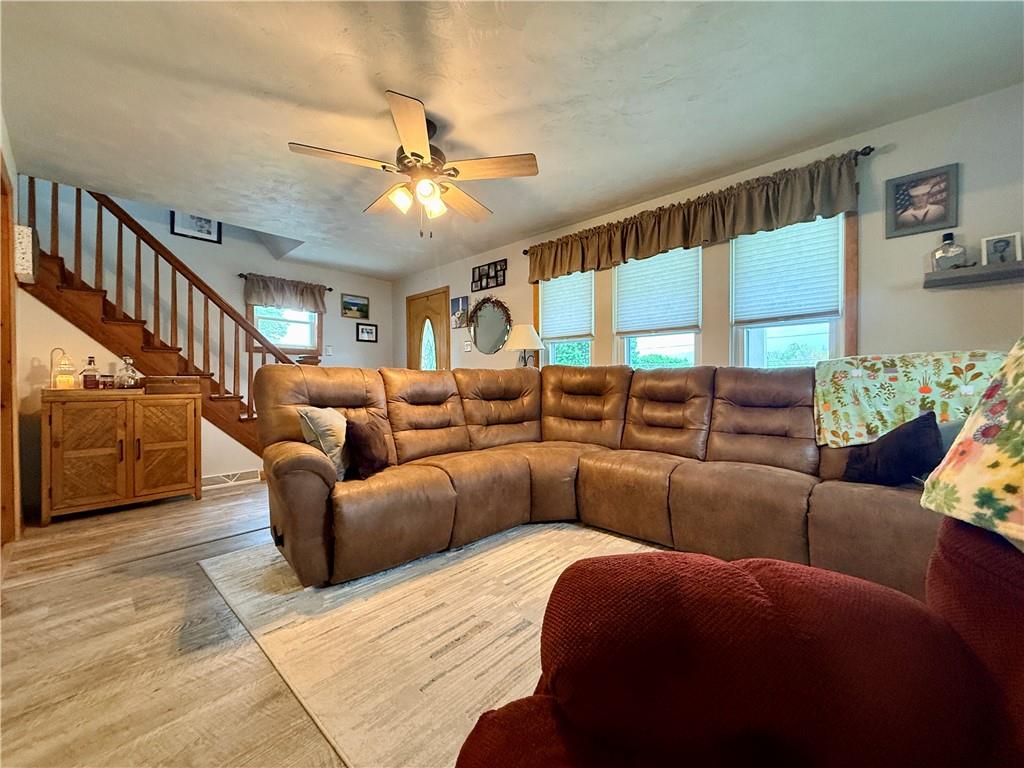 627 Butler Road Kittanning, PA 16201 - Photo 12 of 18 Another view of the living room showing the stairs to the upstairs areas.