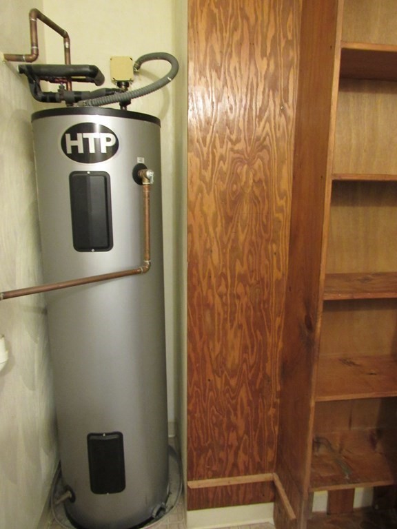 8 Nahant Place, Unit 202 Lynn, MA 01902 - Photo 23 of 24 a bathroom with a toilet and a shower