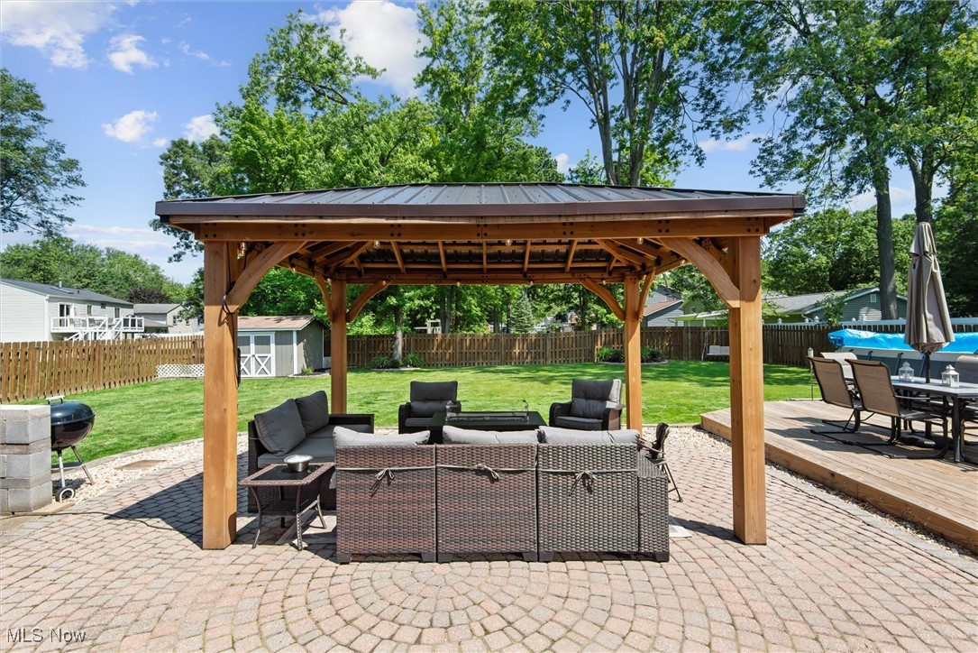 8191 Edgewood Road Mentor, OH 44060 - Photo 38 of 44 Beautiful paver patio with a charming gazebo—ideal for outdoor entertaining and relaxing in your private backyard oasis