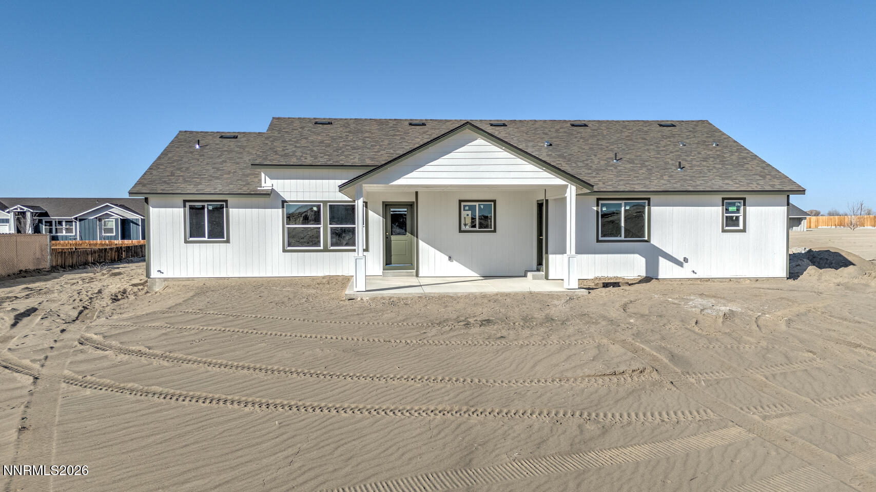 1556 Sky Ridge Drive Fallon, NV 89406 - Photo 4 of 8 a front view of a house with a yard