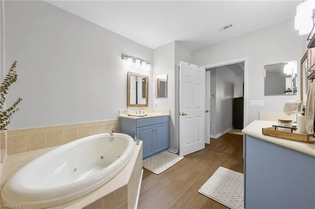 a bathroom with a bathtub sink and toilet