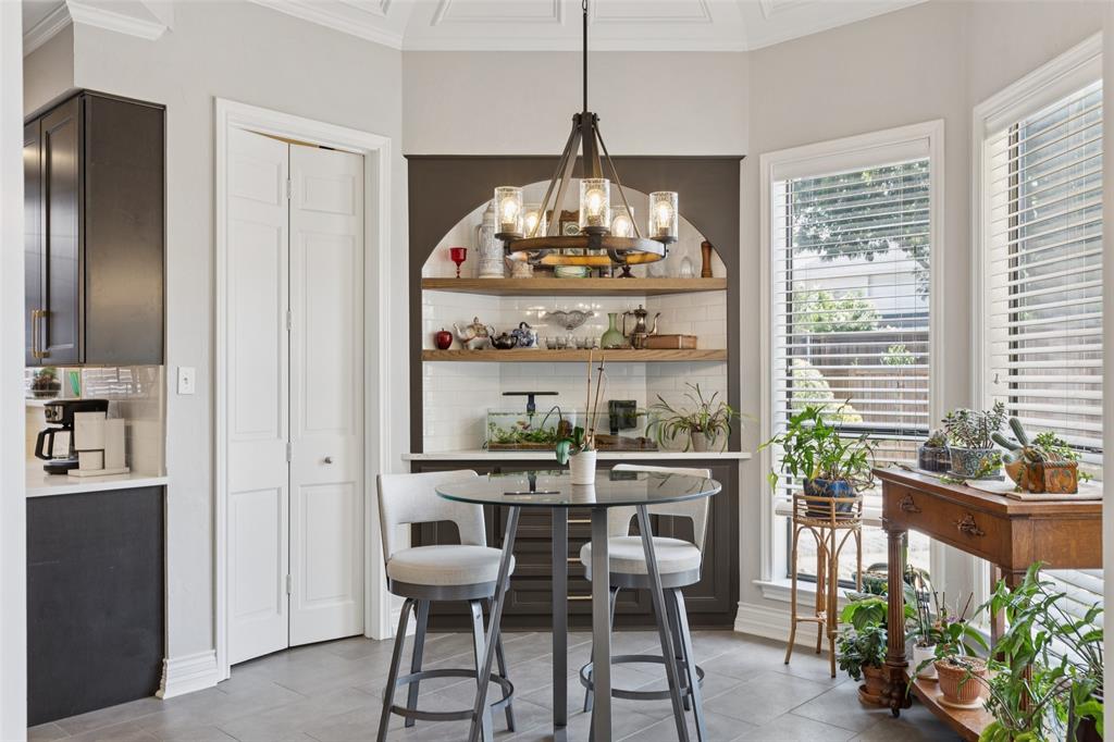 4136 Rainsong Drive Dallas, TX 75287 - Photo 10 of 30 a view of a dining room with furniture window and outside view