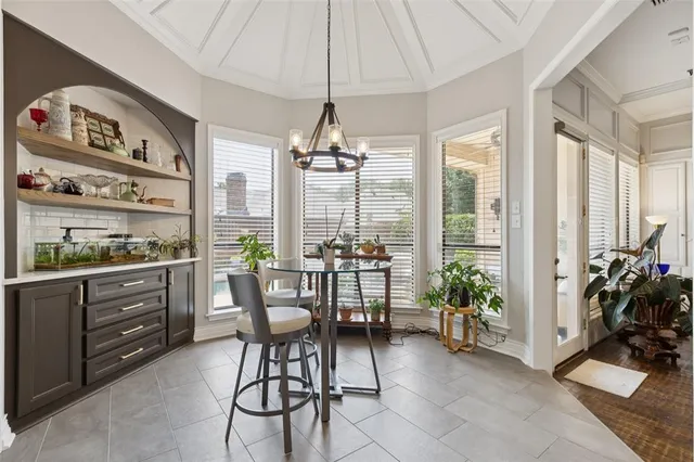 a large kitchen with a lot of counter space and a sink