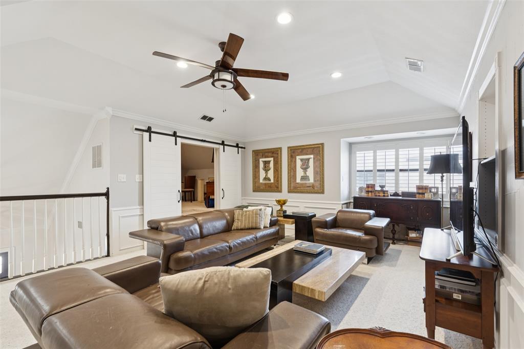 4136 Rainsong Drive Dallas, TX 75287 - Photo 21 of 30 a living room with furniture and a window