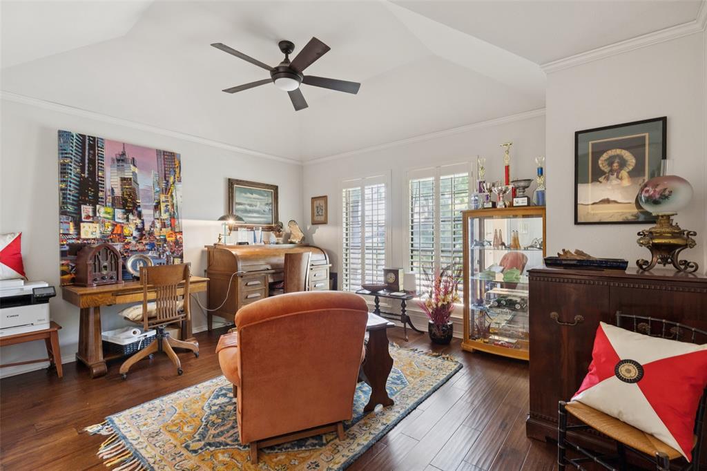 4136 Rainsong Drive Dallas, TX 75287 - Photo 24 of 30 a living room with furniture and a window