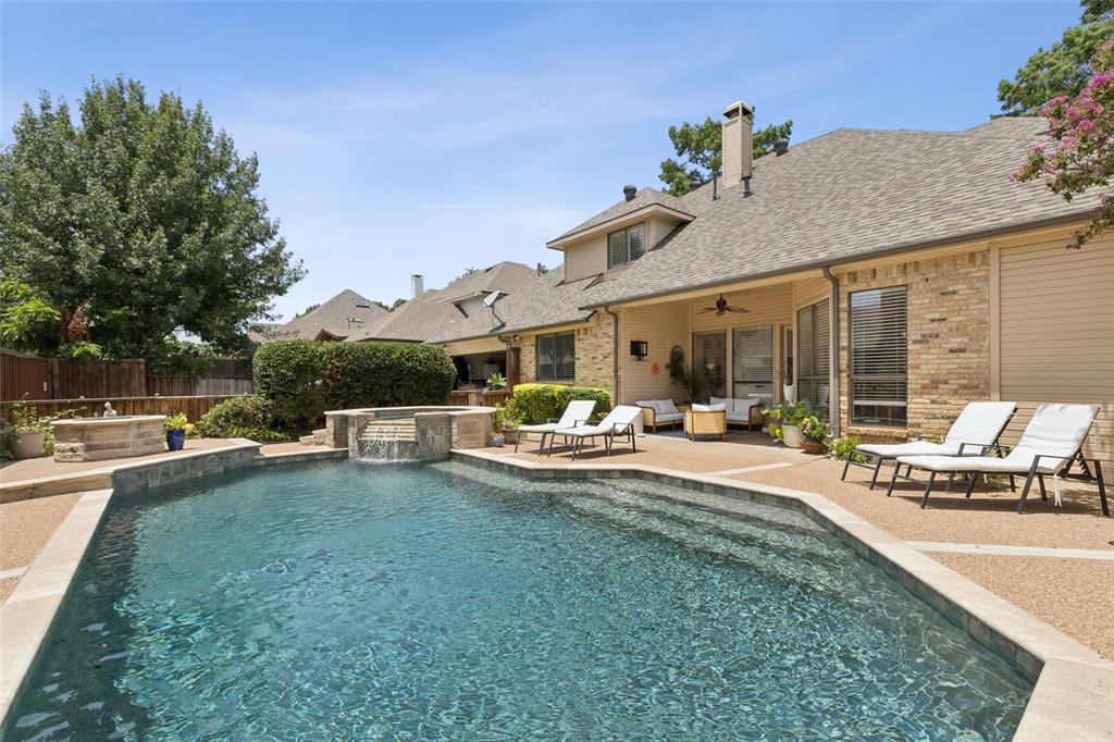 4136 Rainsong Drive Dallas, TX 75287 - Photo 25 of 30 a view of a house with swimming pool and sitting area