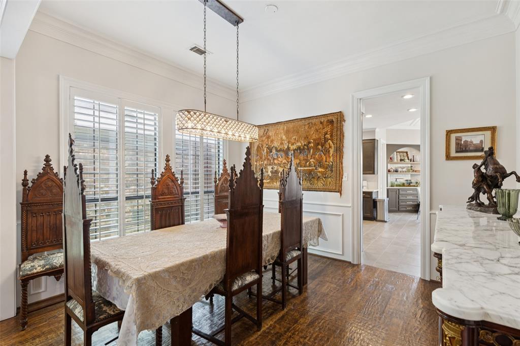 4136 Rainsong Drive Dallas, TX 75287 - Photo 4 of 30 a view of a dining room with furniture window and wooden floor