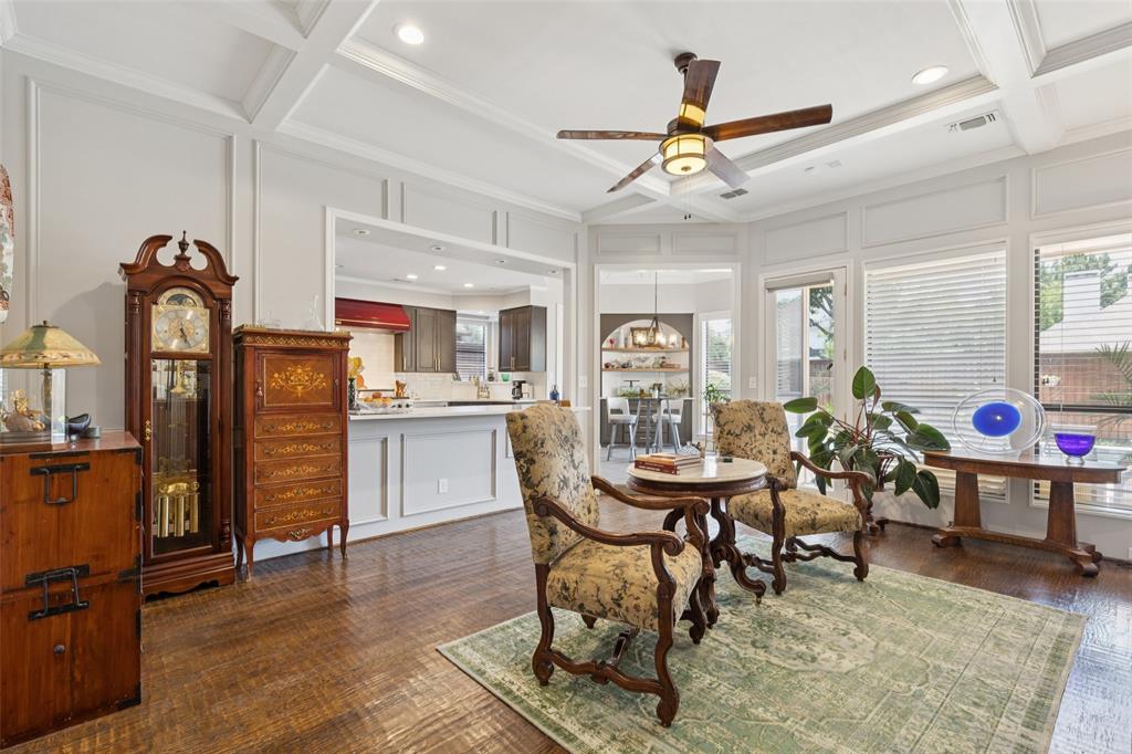 4136 Rainsong Drive Dallas, TX 75287 - Photo 6 of 30 a living room with furniture a dining table and kitchen view