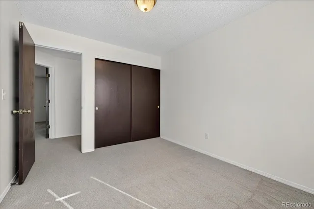 an empty room with closet