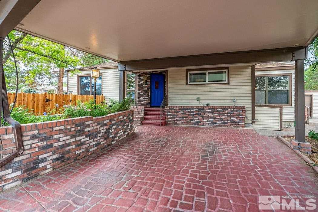 964 Gear Street Reno, NV 89503 - Photo 2 of 21 a front view of a house with garden