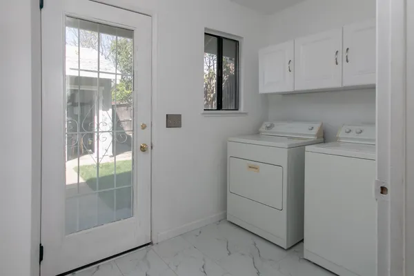 a view of a back yard of the house