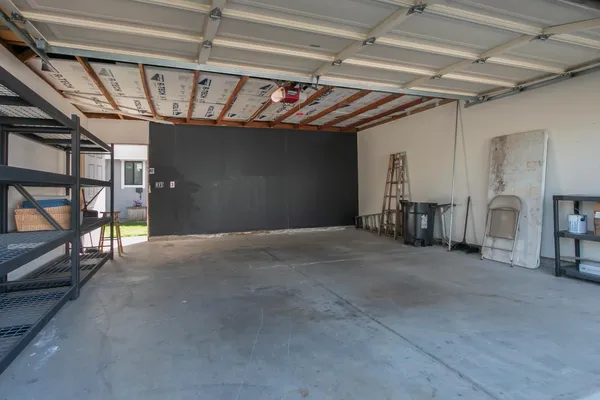 a picture of a living room with a rug