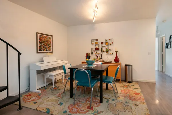 a view of a dining room with furniture