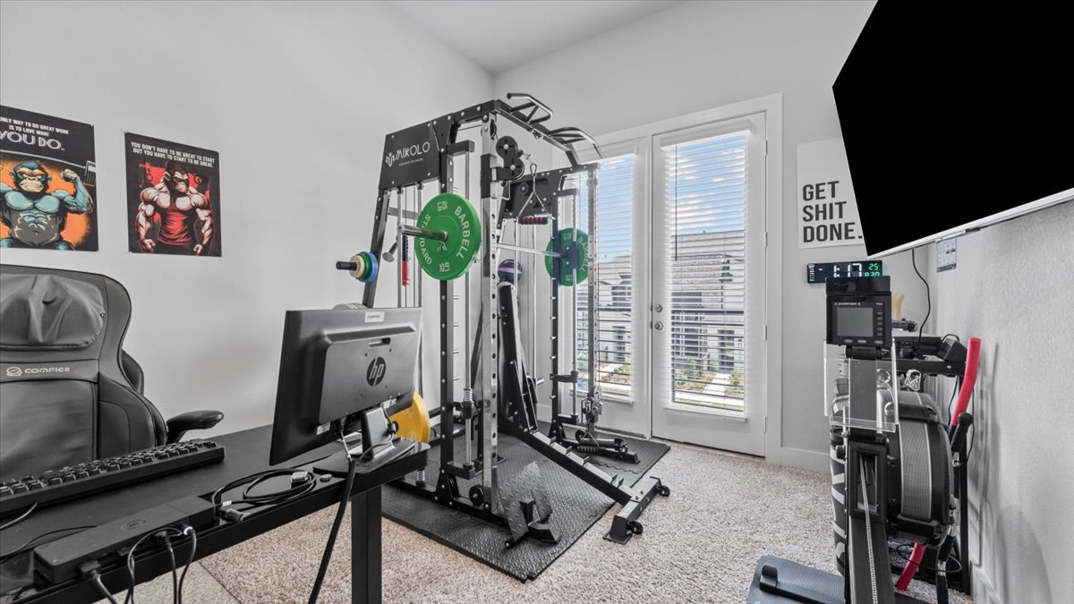 16627 Lake Austin Street Cypress, TX 77433 - Photo 26 of 32 a view of a room with gym equipment