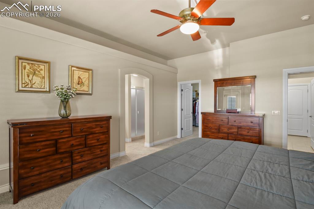 617 Concerto Drive Colorado Springs, CO 80906 - Photo 18 of 46 Another view of the primary bedroom showing the door to the large walk-in closet.