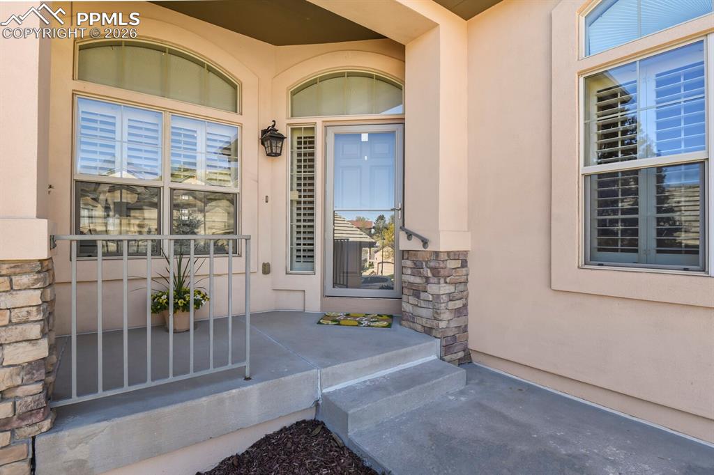 617 Concerto Drive Colorado Springs, CO 80906 - Photo 3 of 46 Welcoming covered entry.