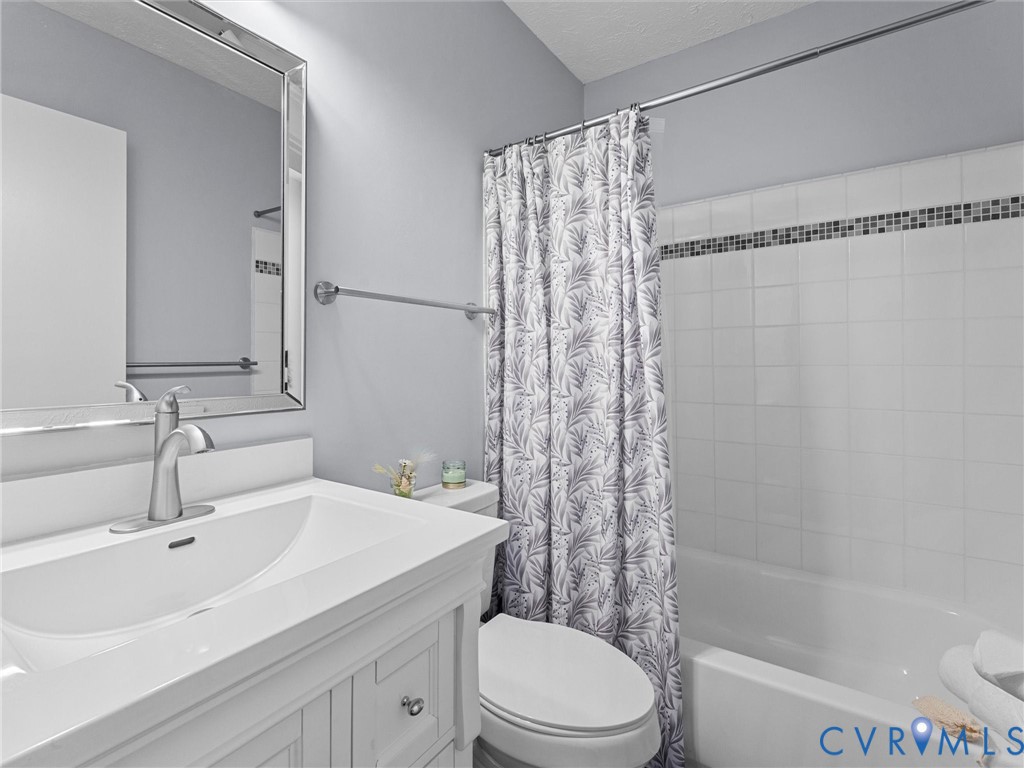 1339 Harris Creek Road Louisa, VA 23093 - Photo 20 of 46 a bathroom with a sink a toilet and shower