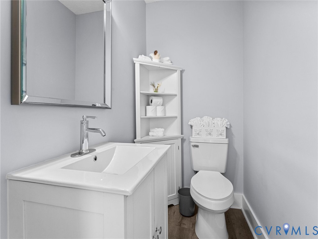 1339 Harris Creek Road Louisa, VA 23093 - Photo 24 of 46 a bathroom with a sink toilet and vanity