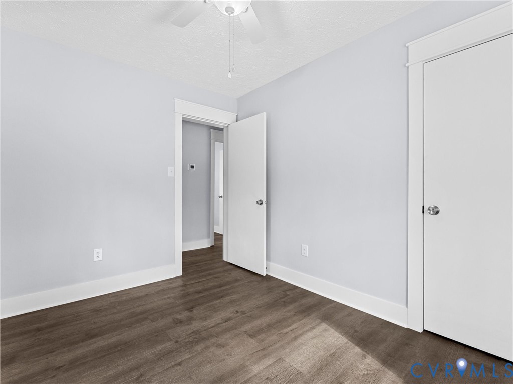 1339 Harris Creek Road Louisa, VA 23093 - Photo 32 of 46 a view of an empty room with wooden floor