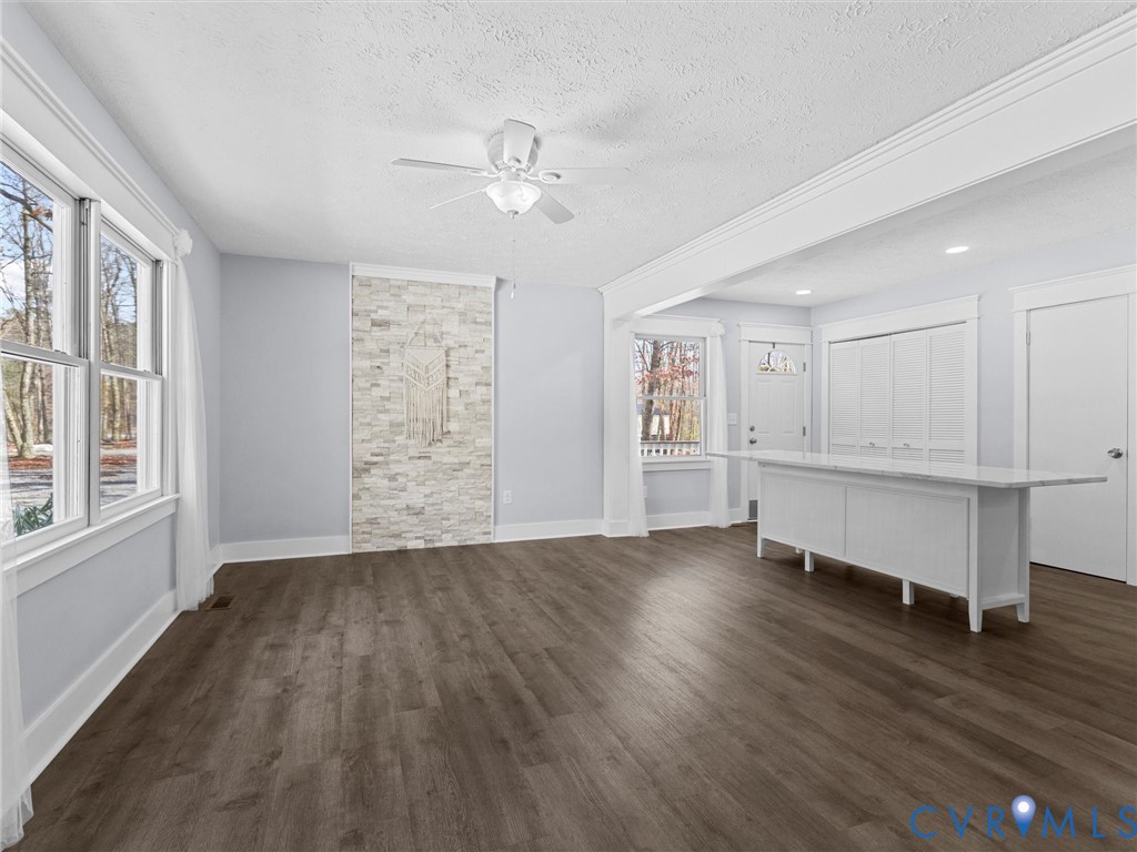 1339 Harris Creek Road Louisa, VA 23093 - Photo 7 of 46 a view of an empty room with wooden floor and a window